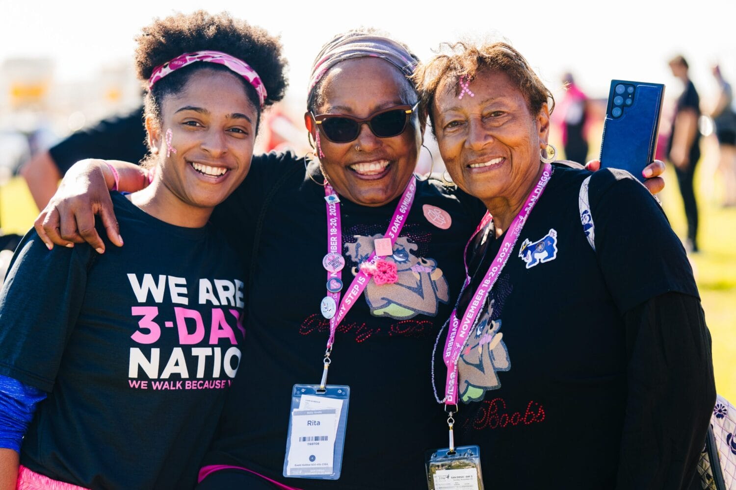 three women participate in a Race for the Cure event